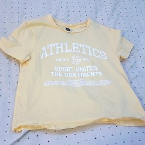 Super cute pale yellow top!